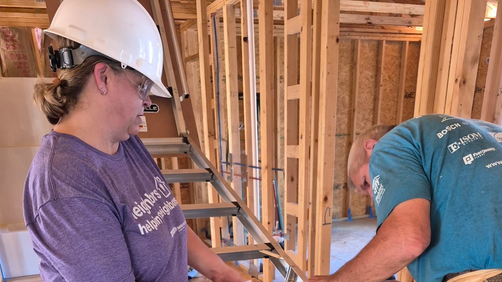 JPS volunteers framing a Habitat for Humanity build